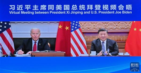 把舵引航，引领中美巨轮共同前行——中美元首视频会晤向世界释放积极信号